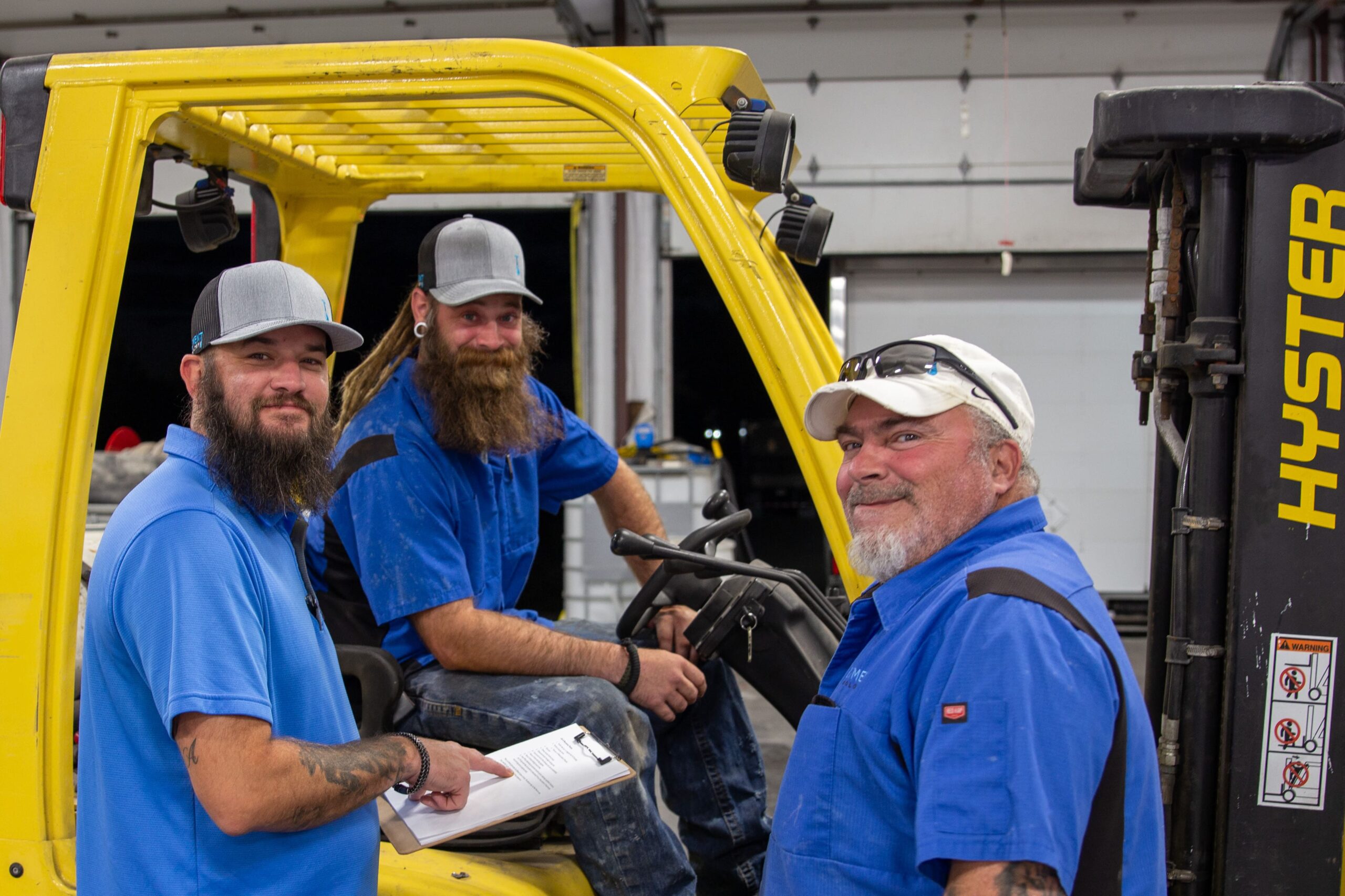 Treatment Tech's qualified team working together on a chemical delivery order